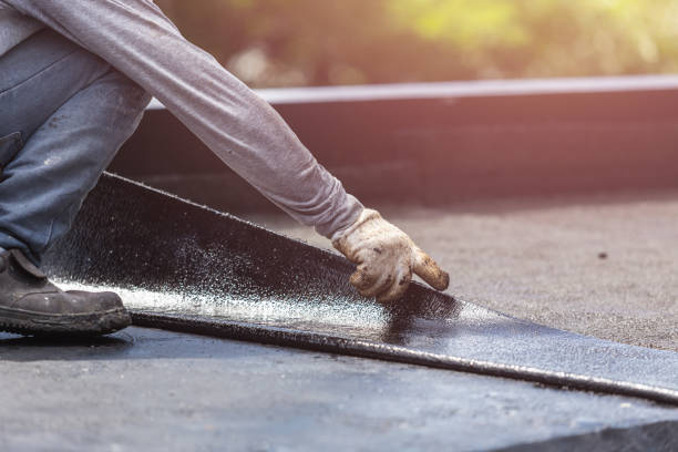 Professional Basement Waterproofing technician working in Sparta, OH